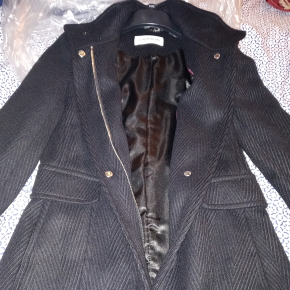 Nike shoes and Calvin Klein coat